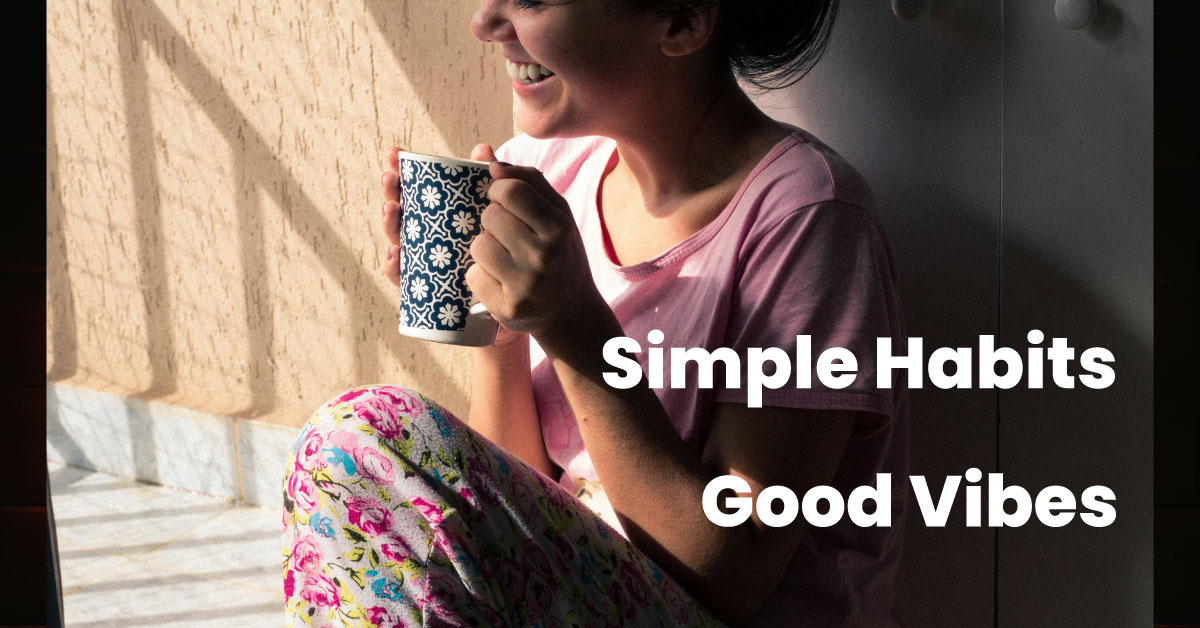 A woman smiling peacefully during her morning routine
